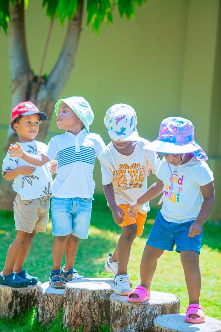 Blue Jays class — children exploring outdoors