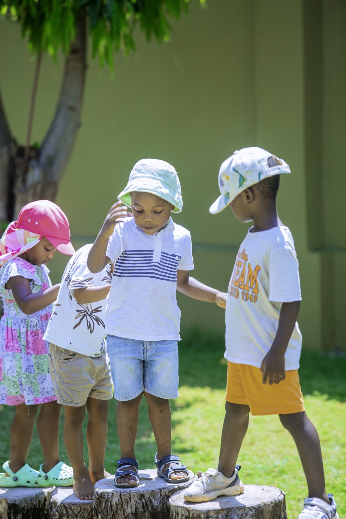 Evermont children exploring and playing together outdoors